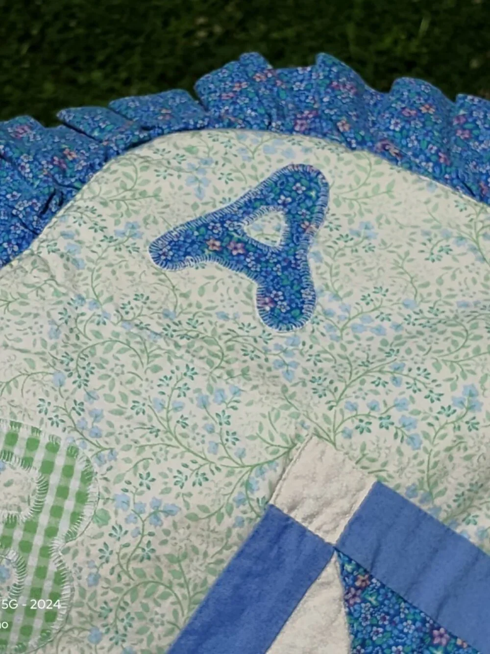 vintage hand made baby quilt ABC 123 blue green white ruffled edge crib sized